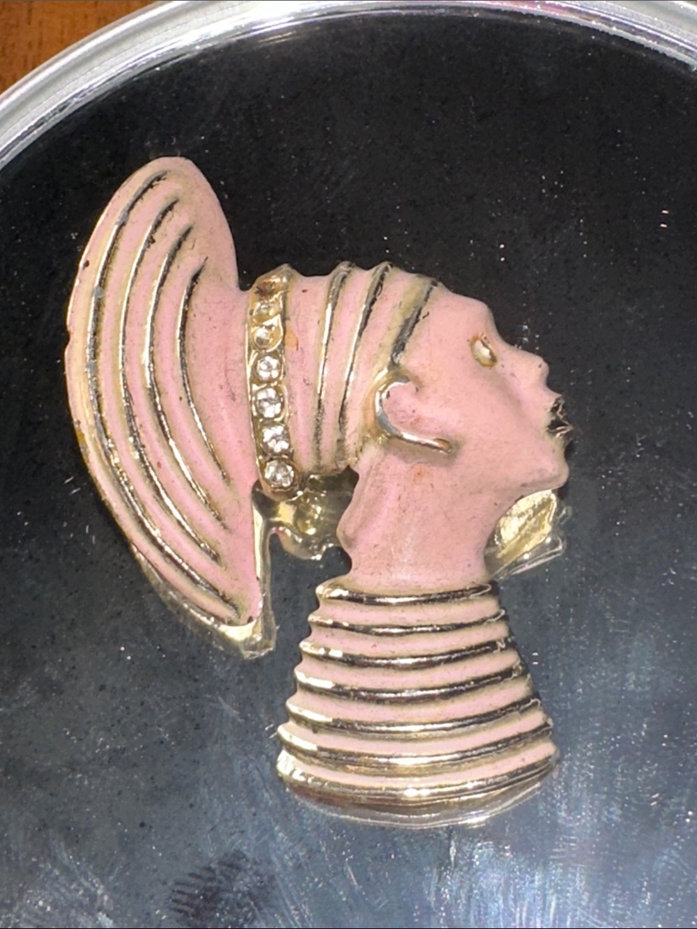 Vintage figural brooch depicting a stylized African or Nubian Queen Profile